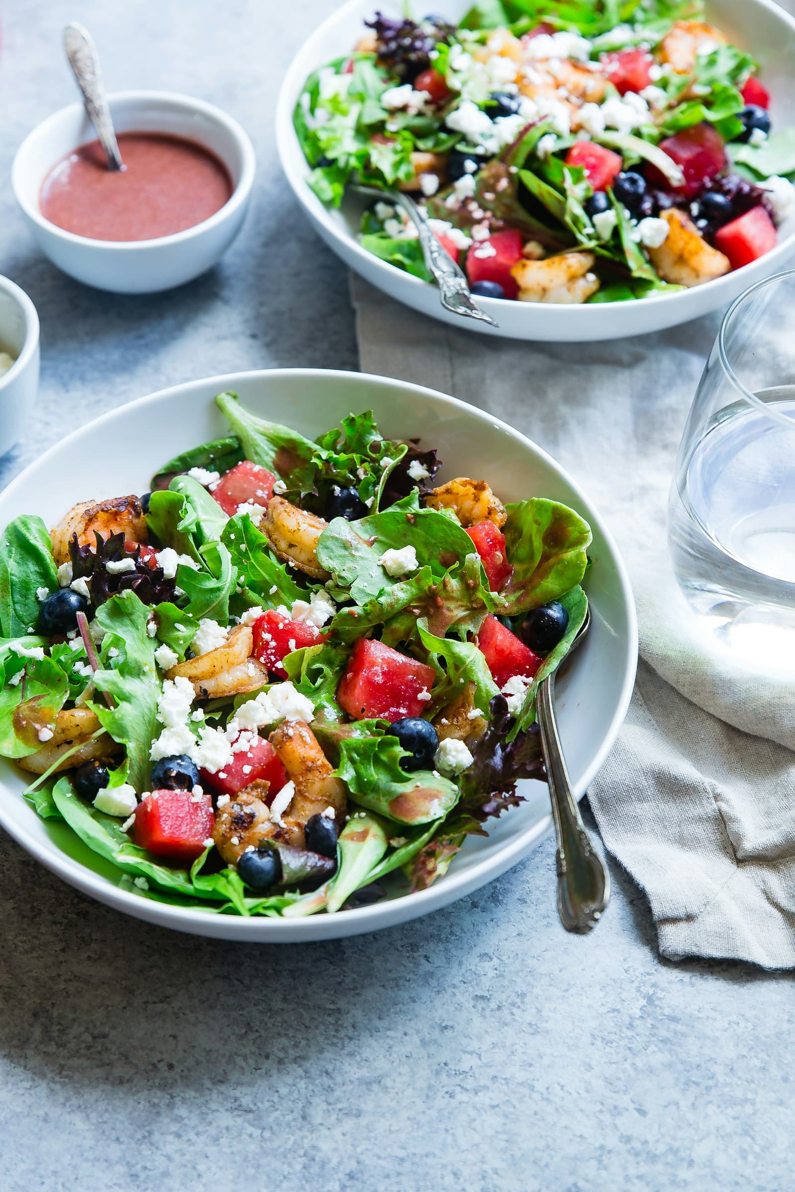 An overhead spread of fresh, colourful dishes